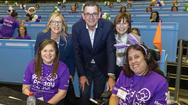 Good Friday Appeal chairman Penny Fowler, Premier Dan Andrews and Victorian Health minister Mary Anne Thomas in the Phone room. Picture: Wayne Taylor