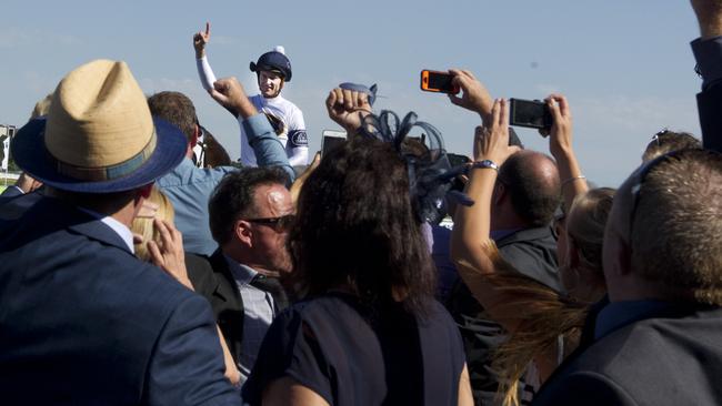 Yankee Rose’s owners rejoice as Zac Purton returns on Yankee Rose. Picture: Jenny Evans