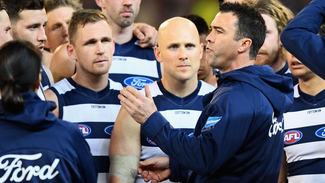 Chris Scott talks to his players during the elimination final.