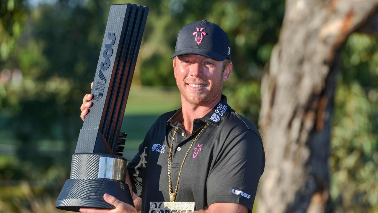 Talor Gooch of the US poses with the trophy after winning the 2023 Liv Golf tournament in Adelaide on April 23, 2023. (Photo by Brenton Edwards / AFP) / -- IMAGE RESTRICTED TO EDITORIAL USE - STRICTLY NO COMMERCIAL USE --