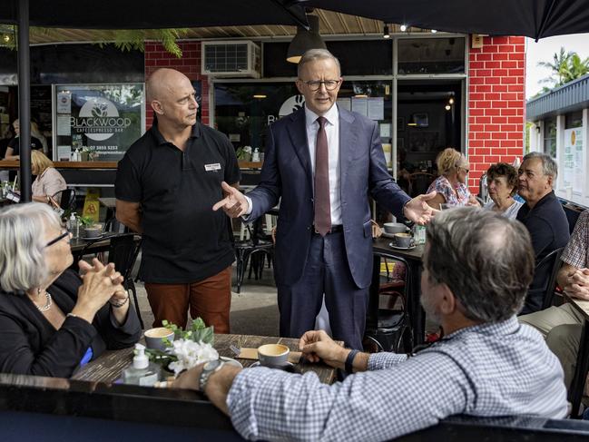 Opposition Leader Anthony Albanese (centre) in Brisbane’s Mitchelton yesterday with Labor candidate for Ryan Peter Cossar. Picture: Sarah Marshall/NCA NewsWire