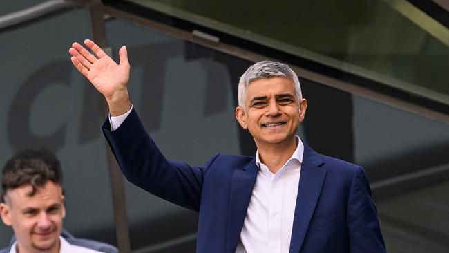 Labour mayor Sadiq Khan waves from the balcony of City Hall after winning an historic third term in office in the London mayoral election. Picture: Getty Images