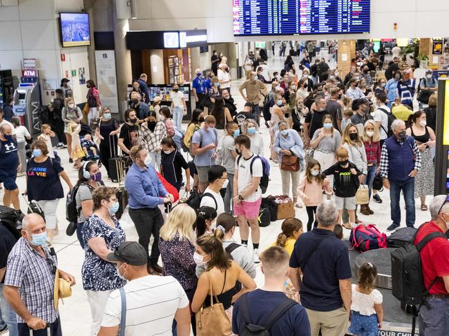 Crowds returning to Brisbane Airport during April school holidays, Saturday, April 9, 2022 - Picture: Richard Walker