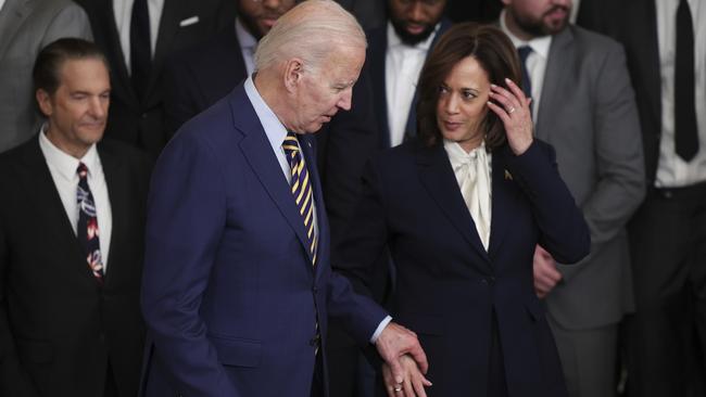 US President Joe Biden holds hands with vice president Kamala Harris in Washington in January. Picture: Getty Images