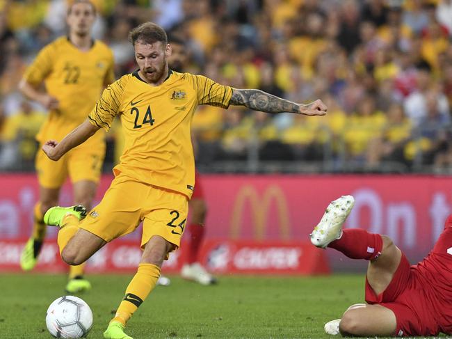 Martin Boyle (left) of Australia scores against Lebanon during the International friendly match between Australia and Lebanon at ANZ Stadium in Sydney, Tuesday, November 20, 2018. (AAP Image/Brendan Esposito) NO ARCHIVING, EDITORIAL USE ONLY