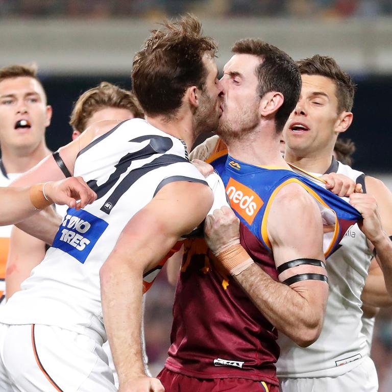 Jeremy Finlayson and Darcy Gardiner wrestle with intent. (Photo by Michael Willson/AFL Photos via Getty Images)