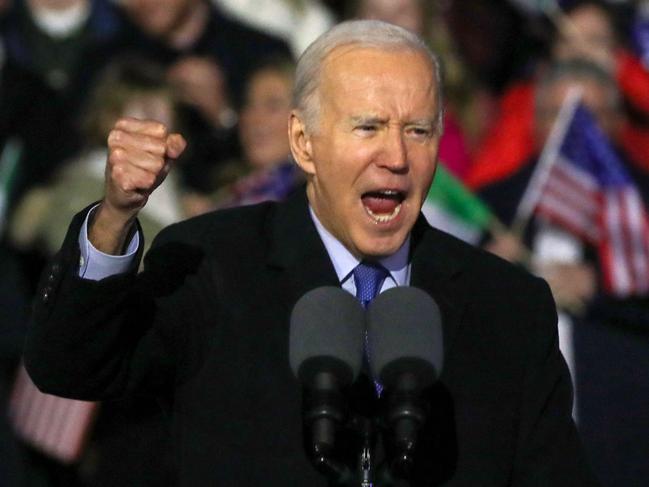 TOPSHOT - US President Joe Biden gestures as he delivers a speech at Saint Muredach's Cathedral in Ballina, on April 14, 2023, on the last day of a four day trip to Northern Ireland and Ireland. (Photo by PAUL FAITH / AFP)