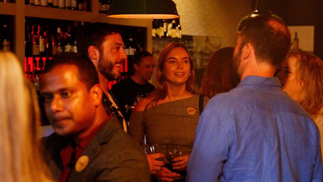 Attendees mingling at the Wine Library. Picture: Max Mason-Hubers