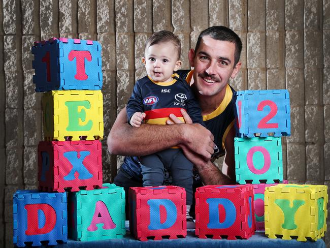 Tex with his son Hugo, ahead of his 200th game. Picture: Sarah Reed