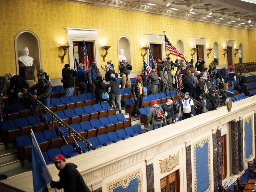 A pro-Trump mob inside the Senate chamber in the US Capitol. Picture: AFP