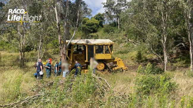 A man aged in his 40s suffered a critical head injury after bulldozer rolls on rural property at Mountain Camp, north of Crows Nest on April 13, 2024.