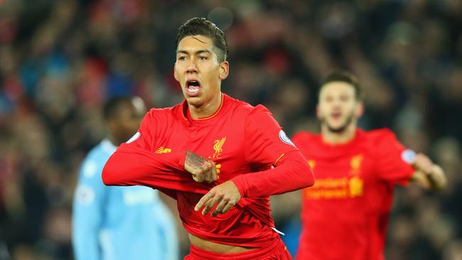 Roberto Firmino of Liverpool celebrates after scoring.