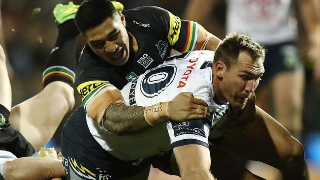 BATHURST, AUSTRALIA — MAY 04: Scott Bolton of the Cowboys is tackled during the round nine AFL match between the Penrith Panthers and the North Queensland Cowboys at Carrington Park on May 4, 2018 in Bathurst, Australia. (Photo by Mark Metcalfe/Getty Images)