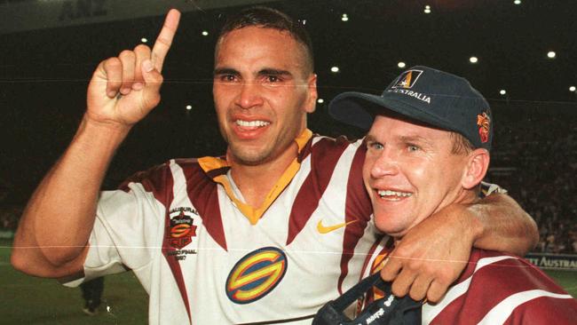 Anthony Mundine and Allan Langer celebrate after their 1997 Super League grand final win.