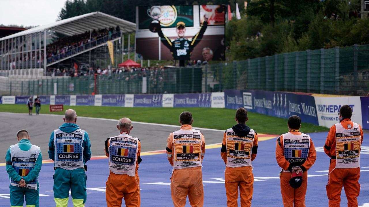 A picture of Hubert is displayed on a screen as marshals observe a minute's silence.