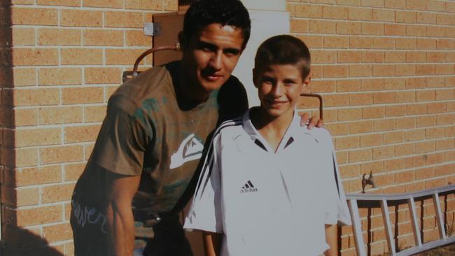 Terry Antonis (aged 11) with Tim Cahill.