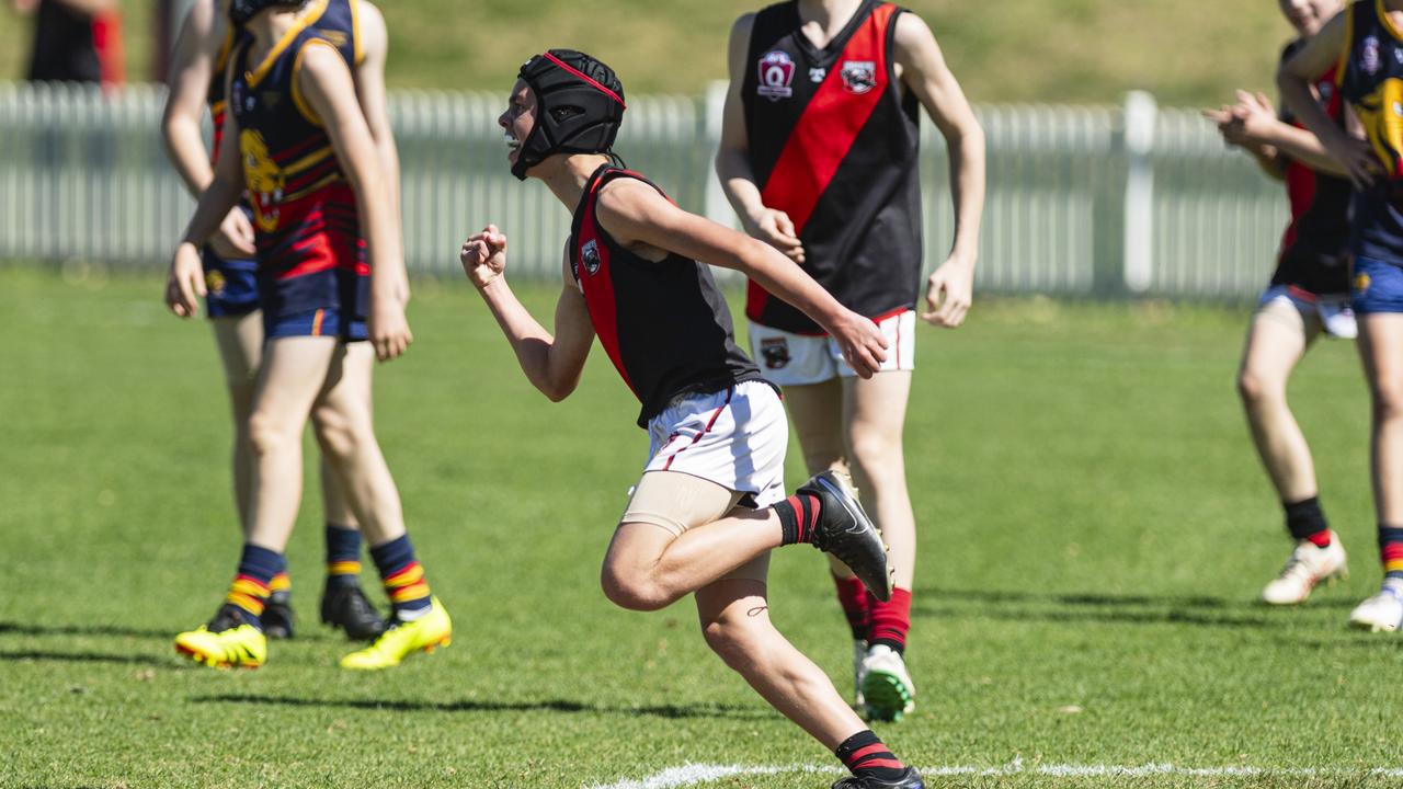 William Koelmeyer celebrates a goal for South Toowoomba Bombers against University Cougars in AFL Darling Downs under-14 mixed grand final at Rockville Park, Saturday, August 31, 2024. Picture: Kevin Farmer