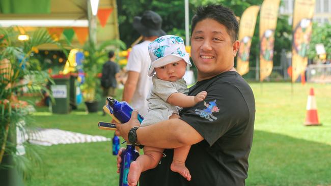 Nathan Tam and his son Alexander, 6 months, at the final event of the 2022 Laksa Festival. Picture: Glenn Campbell