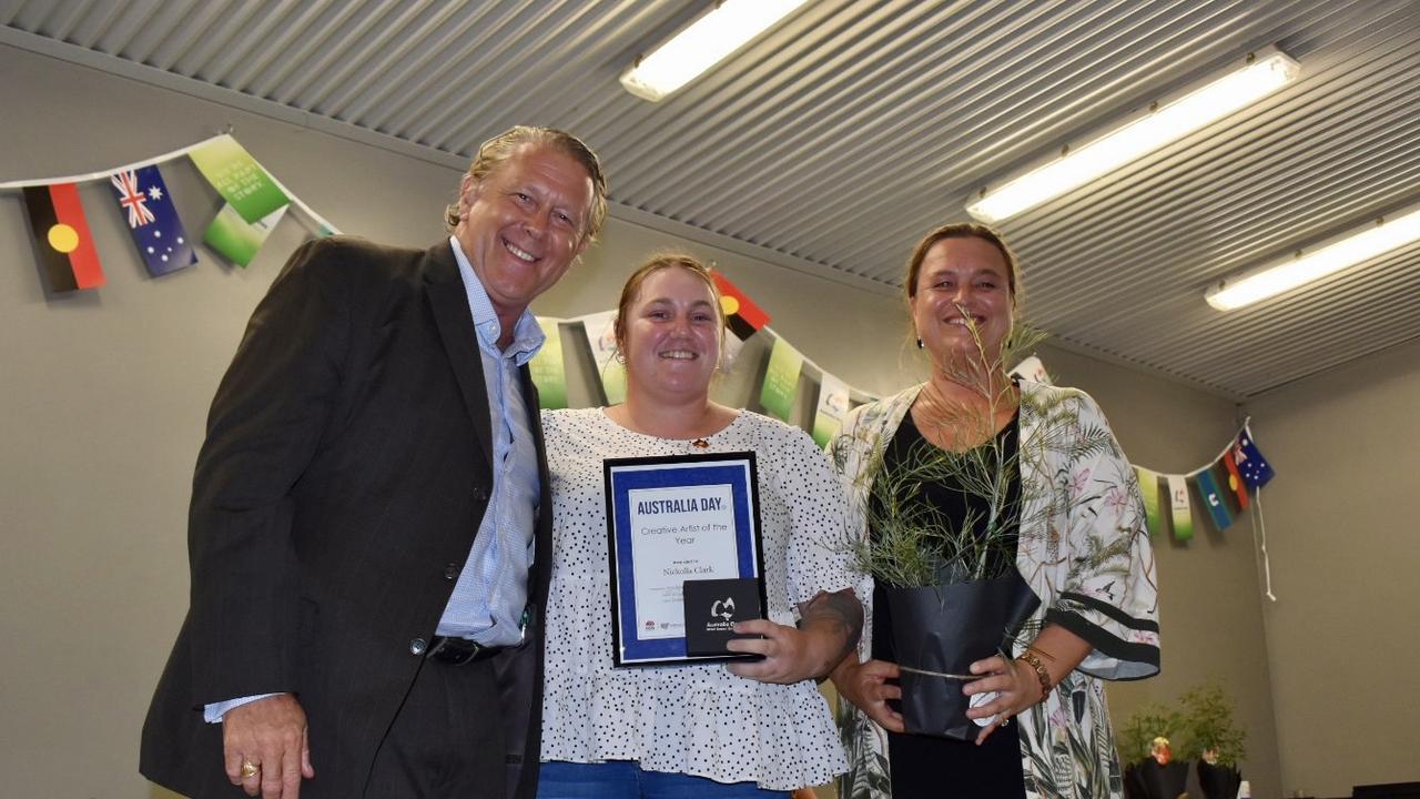 Young Arakwal woman Nickolla Clarke was named the Byron Shire's Creative Artist of the Year. She received her award from Australian Day Ambassador Brad Farmer (left) and Byron Shire councillor Sarah Ndiaye (right).