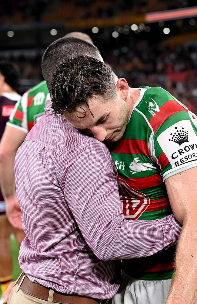 Cameron Murray embraces former teammate Adam Reynolds at Suncorp Stadium. Picture: Getty Images