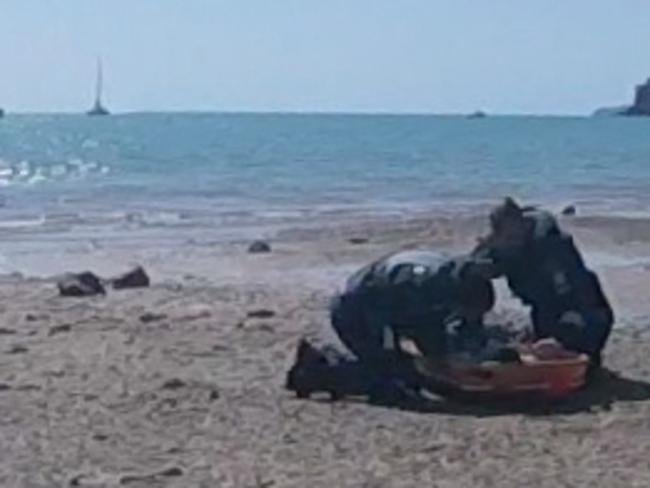 Hannah Papps is treated after the shark attack in the Whitsundays. Picture: RACQ Rescue/AAP