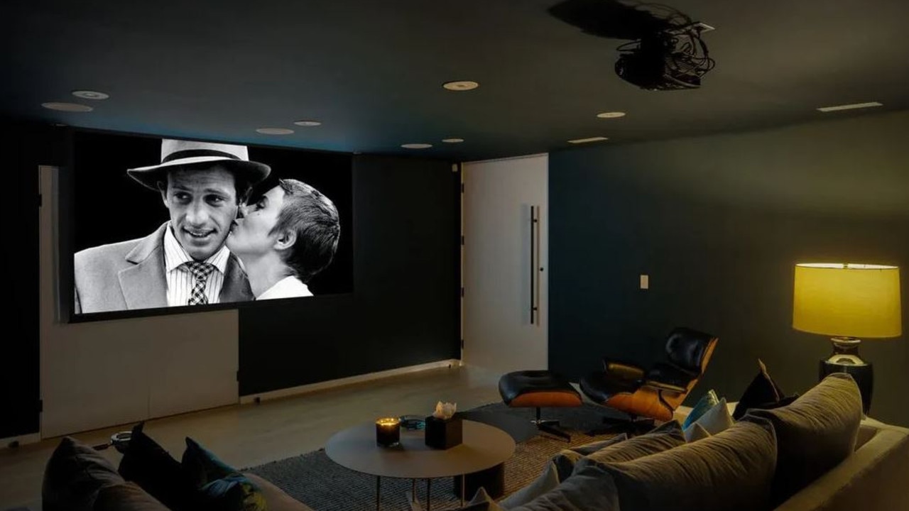 The third bedroom is currently set up as a screening room. Picture: Realtor