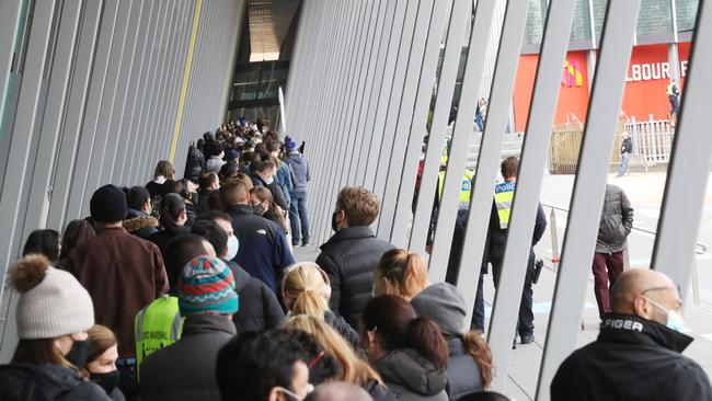 Huge queues caused an up to seven-hour wait for people wanting a jab, including at the Melbourne Convention Centre. Picture: David Crosling