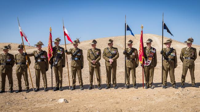 Australian Army soldiers present the Guidons of the 4th and 12th Australian Light Horse Regiments as part of commemoration of the Battle of Beersheba in Israel.