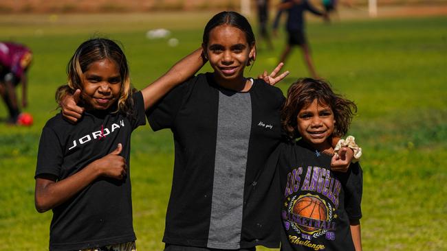 Melbourne Demons players Shane McAdam and Andy Moniz-Wakefield went to Santa Teresa ahead of the 2025 AFL game in Alice Springs. Picture: Melbourne Demons