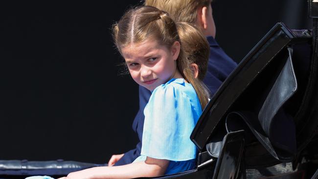 Princess Charlotte wore a light blue dress, complete with a blue bow in her braids, for the Trooping the Colour parade. Picture: AFP