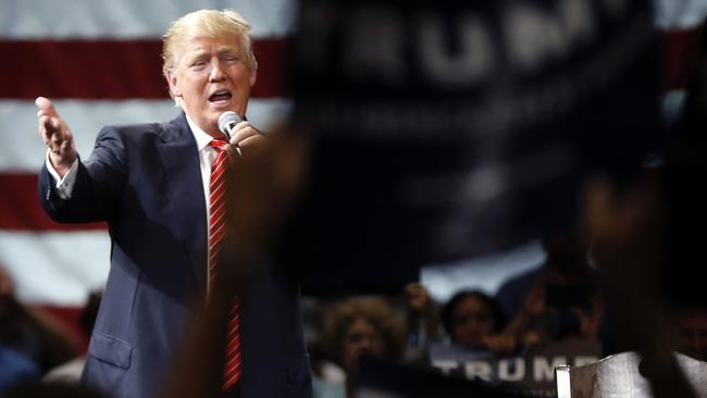 Republican presidential candidate Donald Trump speaks to his supporters at a campaign event in Tampa, Fla., Monday, March 14, 2016. (AP Photo/Gerald Herbert)