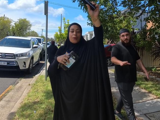 Family members of disgraced nurse Sarah Abu Lebdeh at their home in Western Sydney.