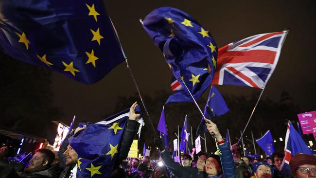 Anti-Brexit demonstrators react after the results of the vote. Picture: AP.