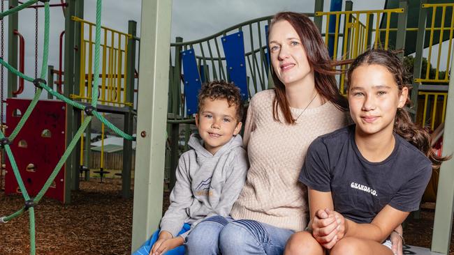 Taro aged 8 and Zita aged 11 with their mum Jessica Yasuda who is worried about the rising costs of sending her children back to school after the summer holidays.Picture: Linda Higginson