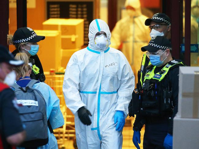 Lockdown of public housing commission flats in Flemington due to an outbreak and second wave of coronavirus across Melbourne, Victoria. Emergency services pack up outside 159 Melrose Street North Melbourne where no residents tested positive for the coronavirus. Picture : Ian Currie