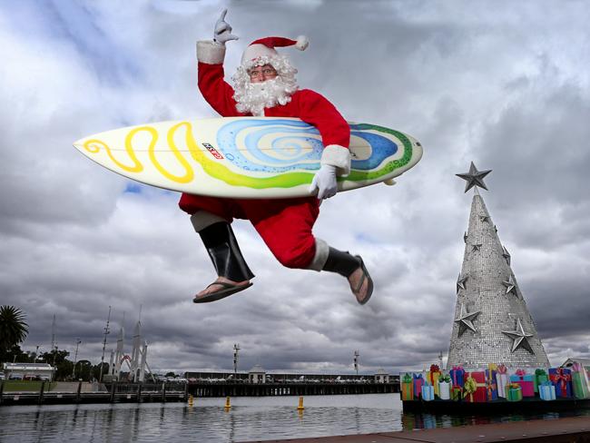 Santa braces for a run of hot weather on Geelong’s waterfront. Picture: Glenn Ferguson