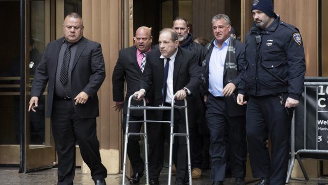 Harvey Weinstein, with the aid of a walker, leaves court following a hearing in New York this week. Hours later he was pictured out shopping without it.