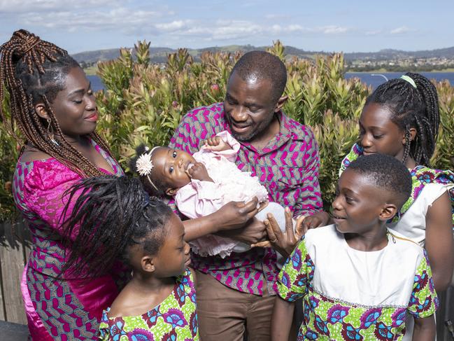 John Kamara says he loves being a dad. Pictured with wife Mavis and children Jonavia, 6, Joneva, 7 months, John-Zion, 9, and Jonievis, 11. Picture: Eddie Safarik