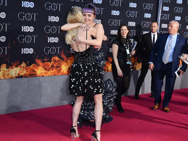 British actress Maisie Williams (R) and British actress Sophie Turner (L) arrive for the 