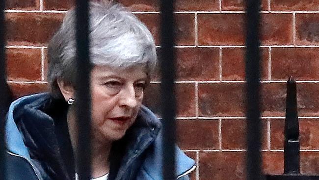 Theresa May leaves from the rear of 10 Downing Street. Picture: AFP.