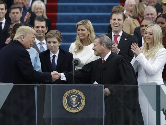 Donald Trump shakes hands with Chief Justice John Roberts after being sworn in as the 45th president of the United States on during the 58th Presidential Inauguration at the U.S. Capitol in Washington on January 20, 2017. Picture: AP