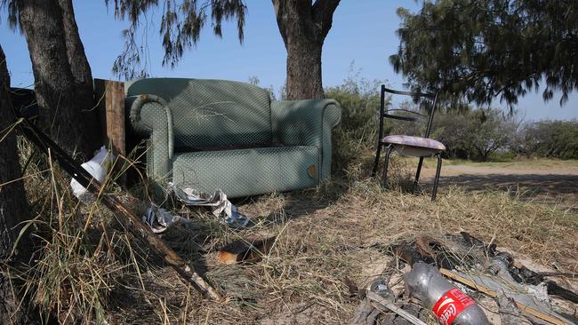 A couch has been dumped at the Spit. Picture by Scott Fletcher.