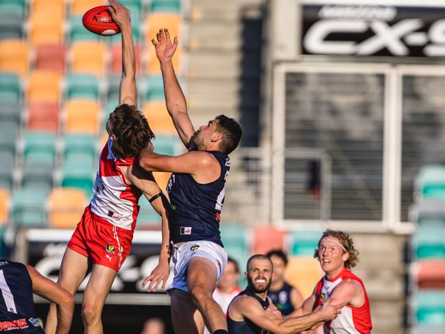 Clarence’s Baker Smith and Launceston’s Hamish Leedham contest for the ball. Picture: Linda Higginson