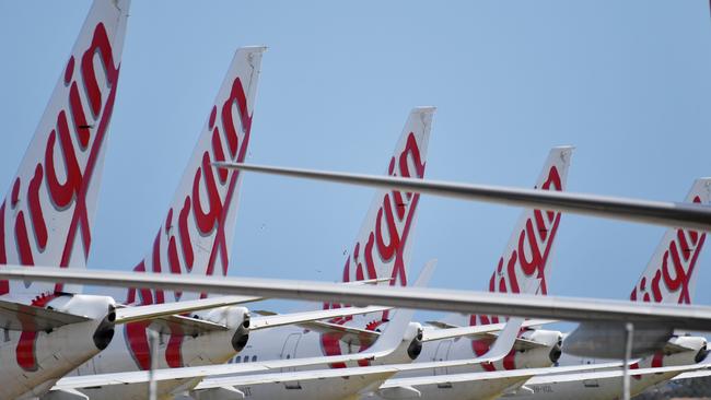 Virgin Australia planes parked on the tarmac at Adelaide Airport in April. Picture: AAP