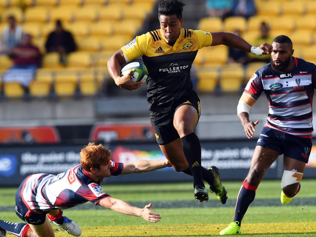 Julian Savea charges through the Rebels defence.