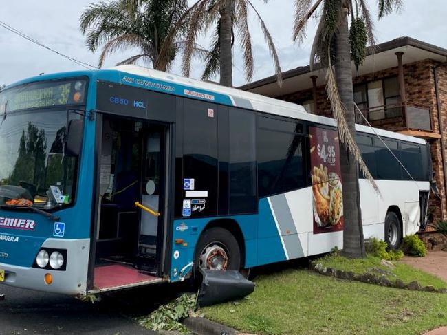 A bus ran into the front of a Wollongong home after rolling through the street, hitting two parked cars and a power pole, after the driver suffered a suspected medical episode. Supplied Image
