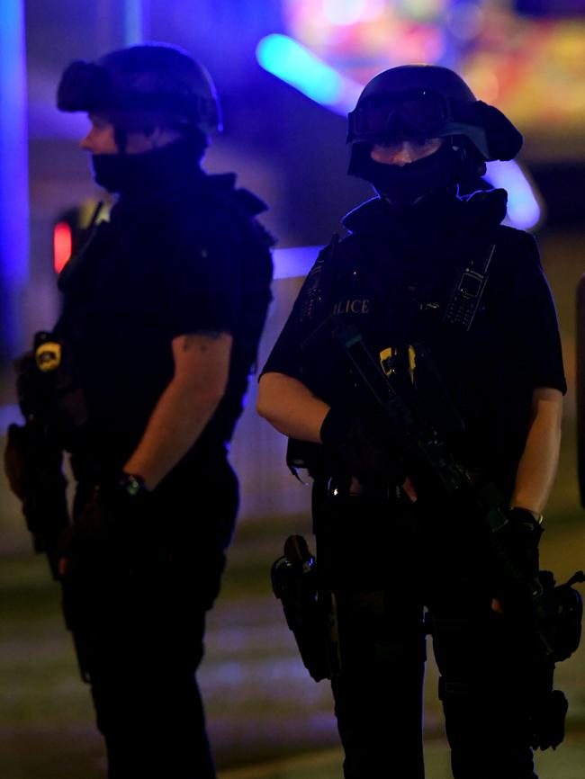 Armed police deployed at scene of the explosion. Picture: AFP Photo/Paul Ellis