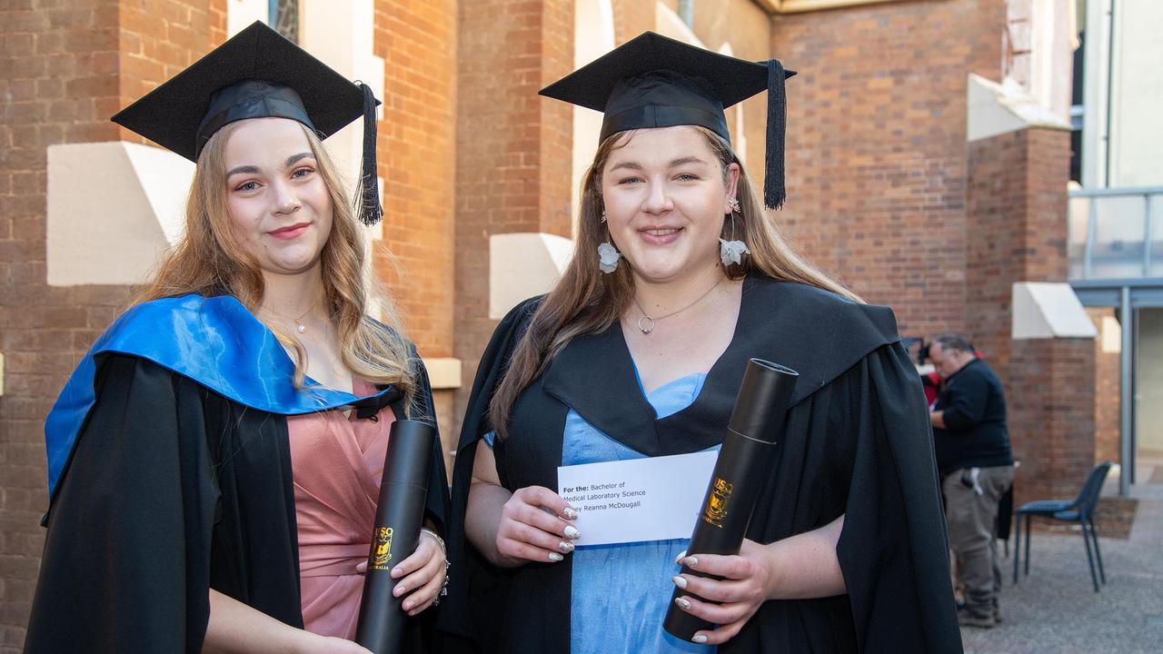 Caitlin Shore (left) graduates with a Bachelor in Nursing and Abbey McDougall a Bachelor in Medical Laboratory Science. UniSQ graduation ceremony at Empire Theatre, Tuesday June 27, 2023.