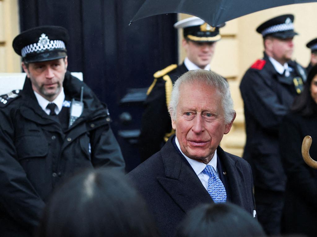 King Charles spoke to stunned tourists as he left the event. Picture: AFP