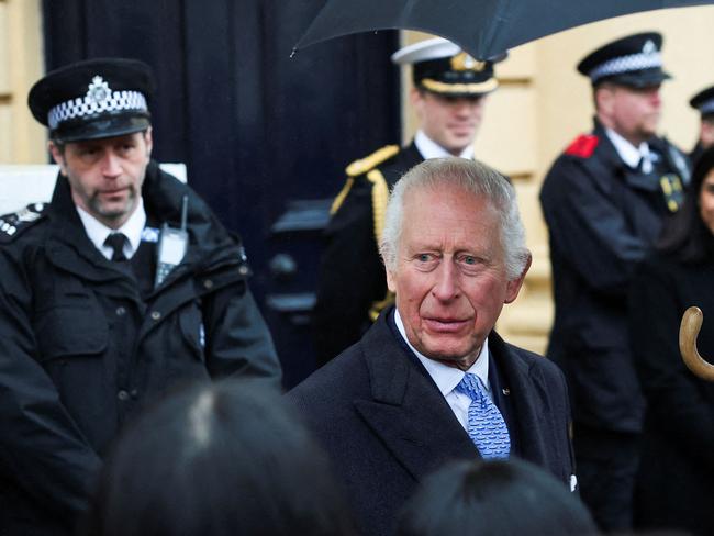 King Charles spoke to stunned tourists as he left the event. Picture: AFP